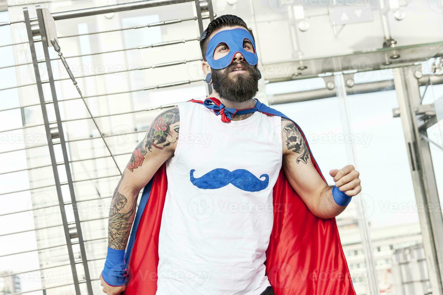 young hipster superhero fights evil photo