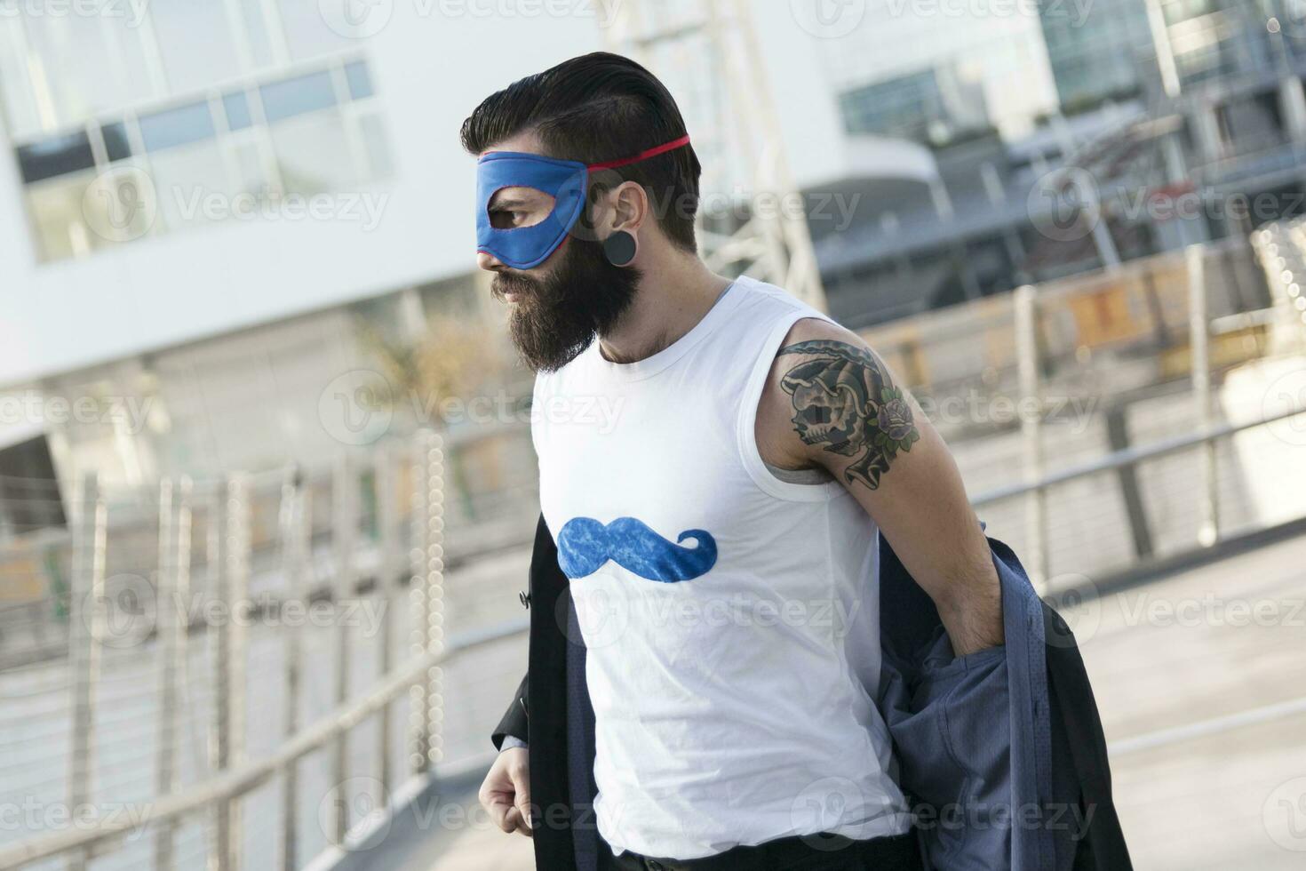 young hipster superhero fights evil photo