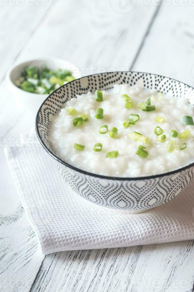 Bowl of congee - Asian rice porridge photo