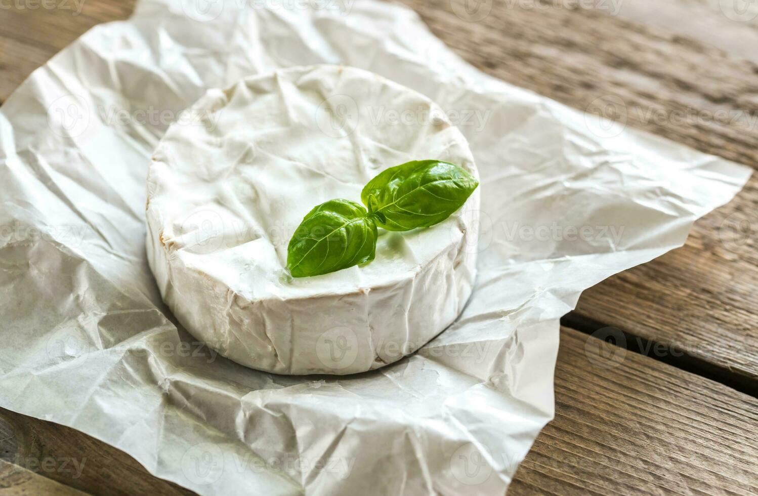 Camembert cheese wheel photo