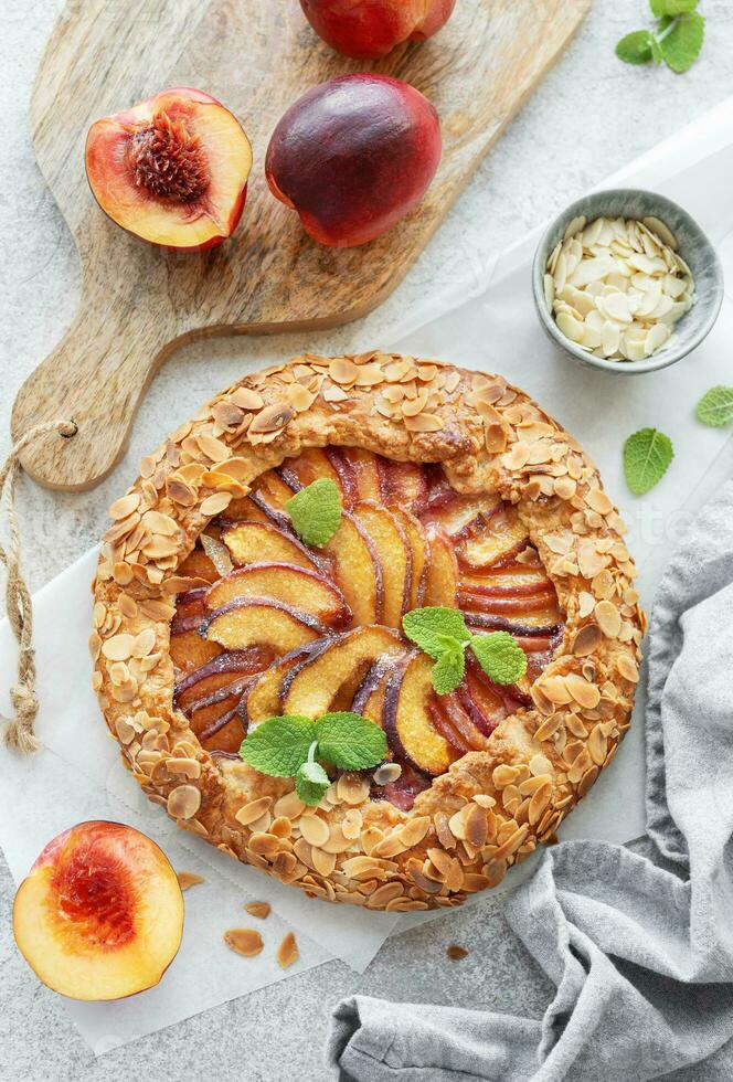 Homemade  galette with peaches. photo