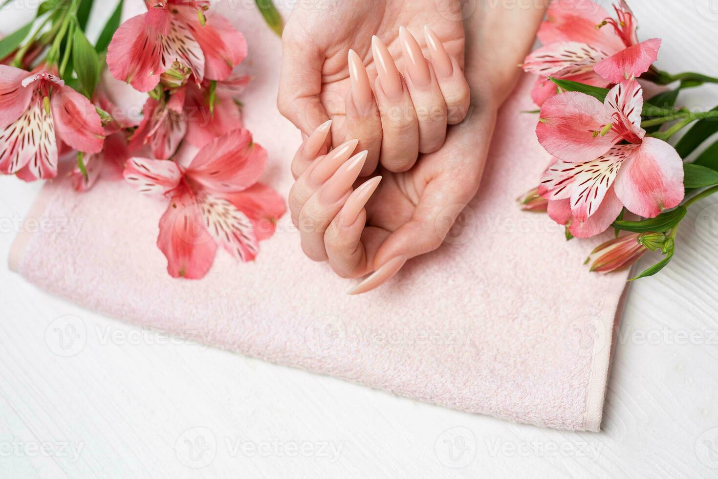 Elegant pastel pink natural manicure. photo