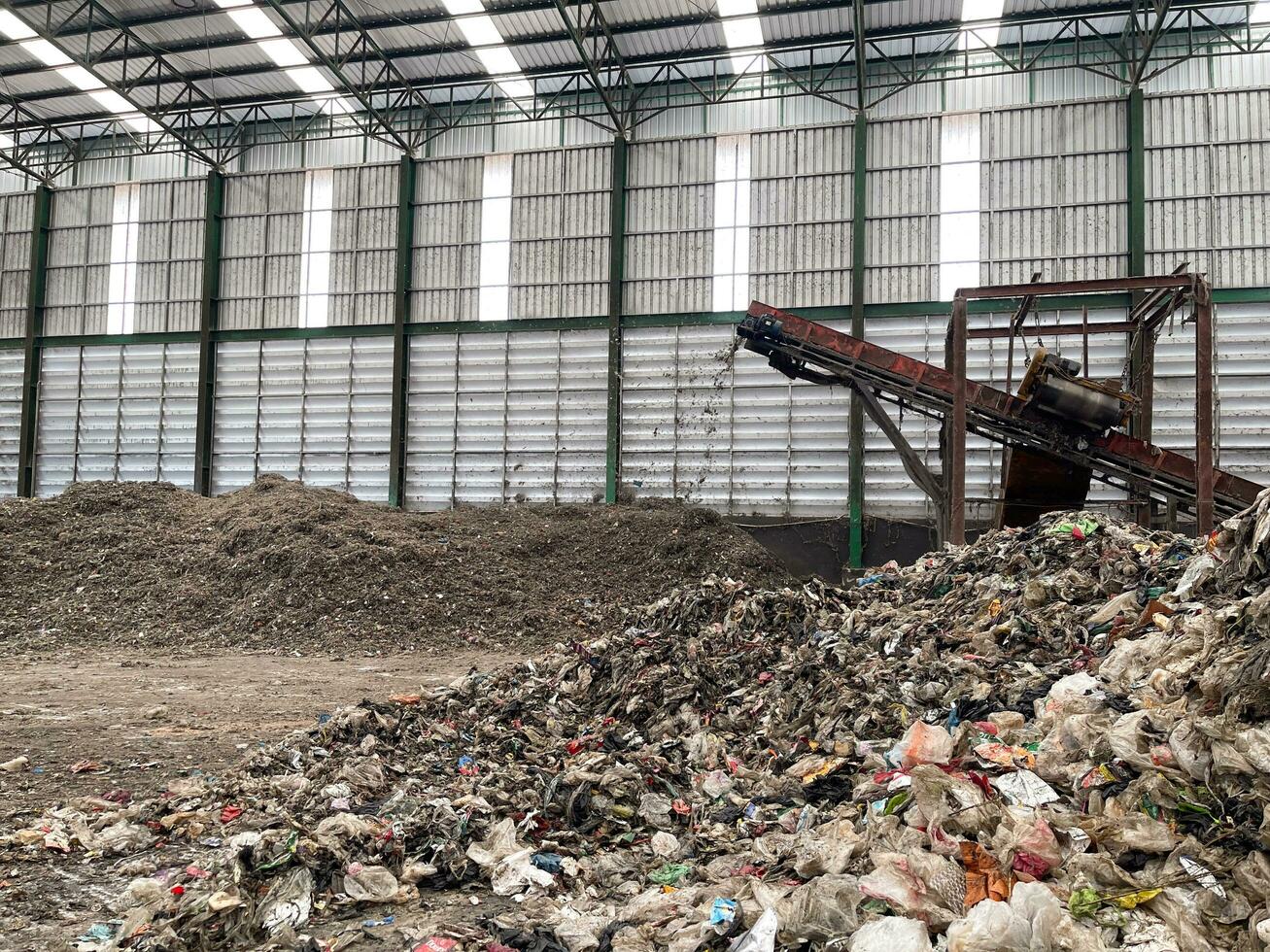 August 24, 2023 Waste disposal plant inThailand, Garbage pile in waste disposal plant for sorting and preparing for recycle. photo