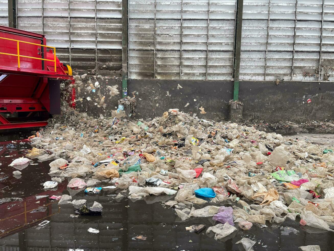 August 24, 2023 Waste disposal plant inThailand, Garbage pile in waste disposal plant for sorting and preparing for recycle. Waste plastic bottles and other types of plastic waste at the waste. photo