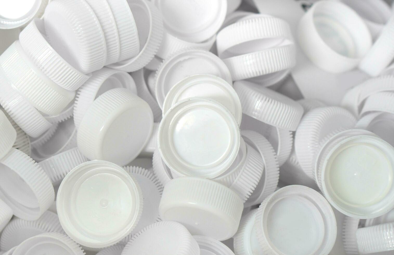 The plastic lid that is left over from the bottles are collected to be recycled into other items for reuse. photo