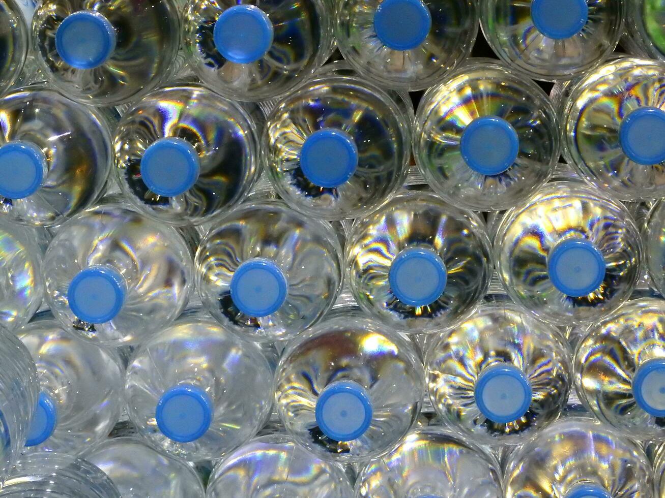 Close Up on mineral water bottles in top view photo