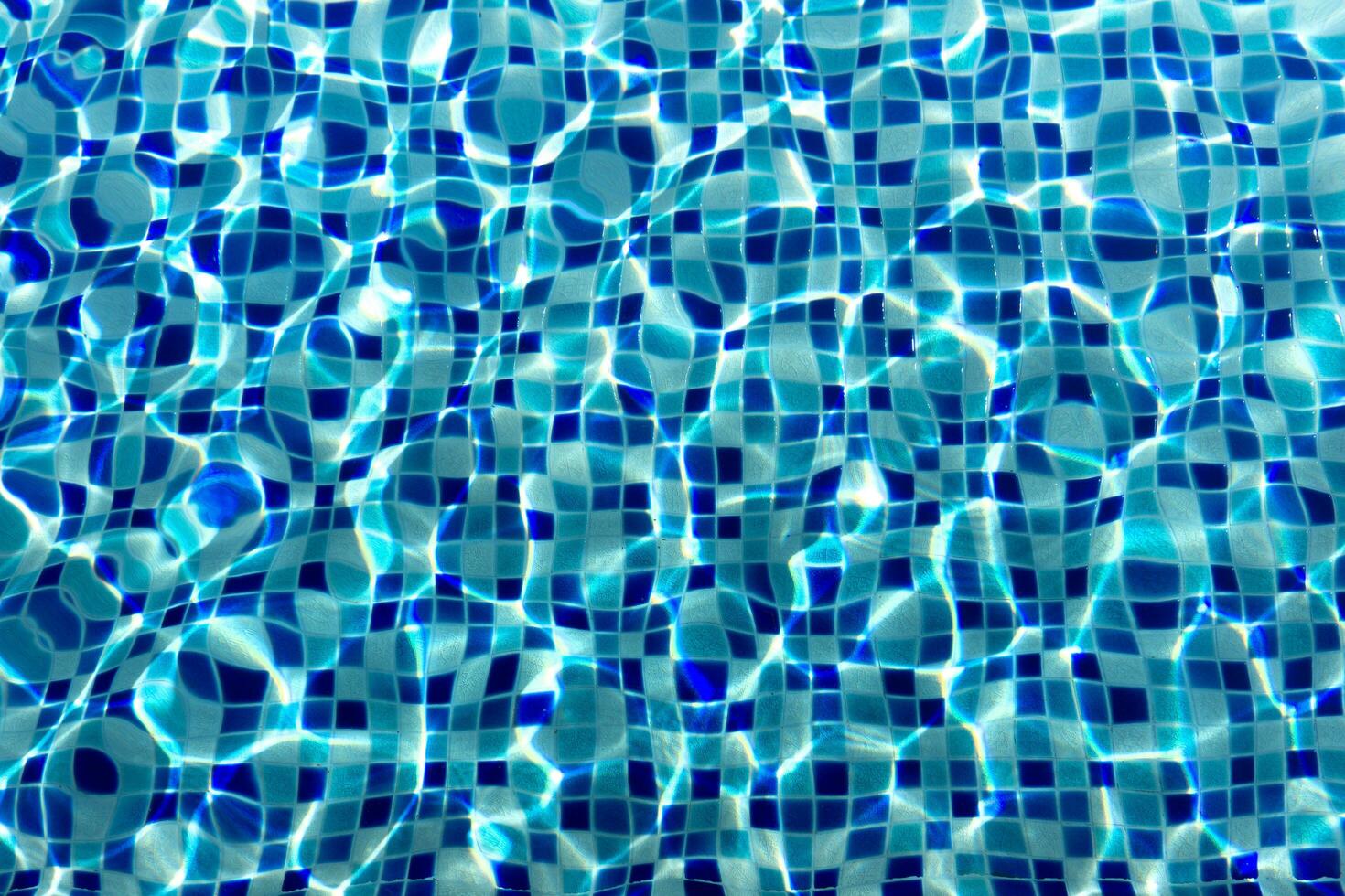 Ripple and flow with waves swimming pool bottom background photo