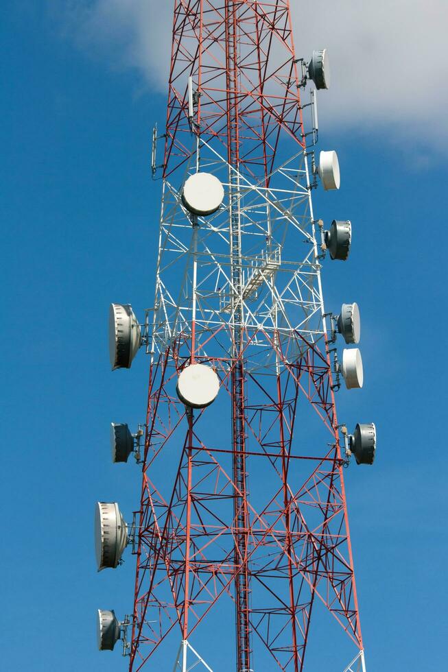 Telecommunication tower under blue sky photo