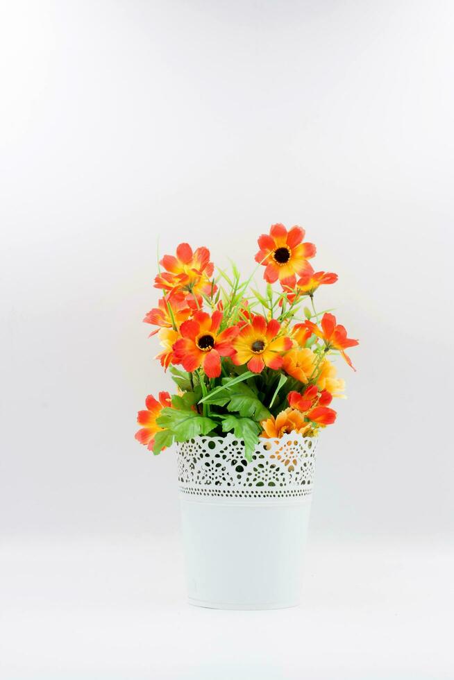 Plastic flower in vase photo
