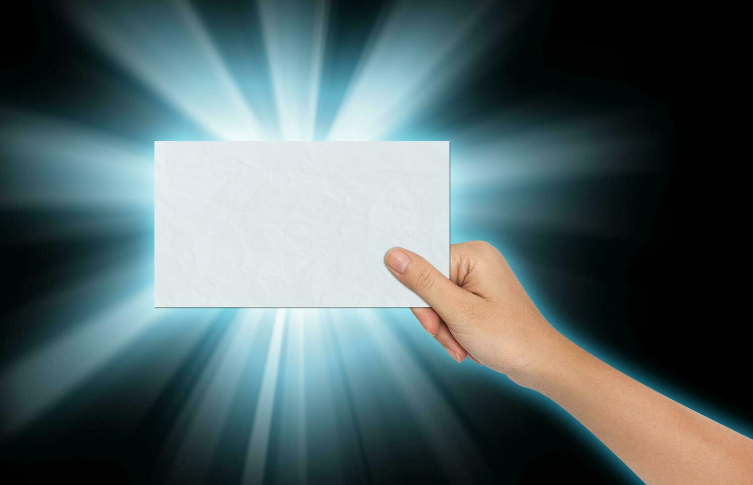 Hand of Female Holding a Blank paper photo