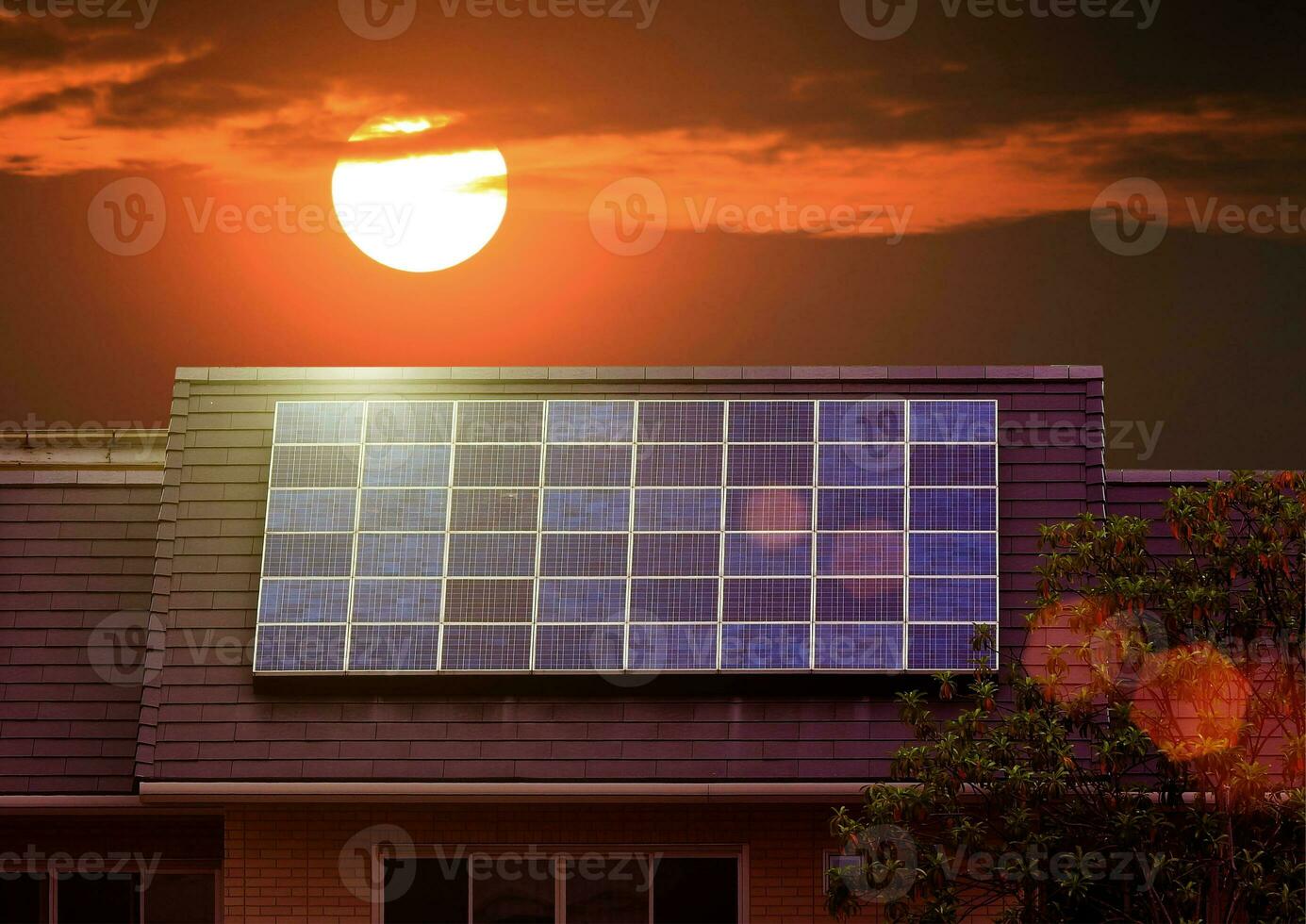 Green energy of solar cell panel on house roof photo