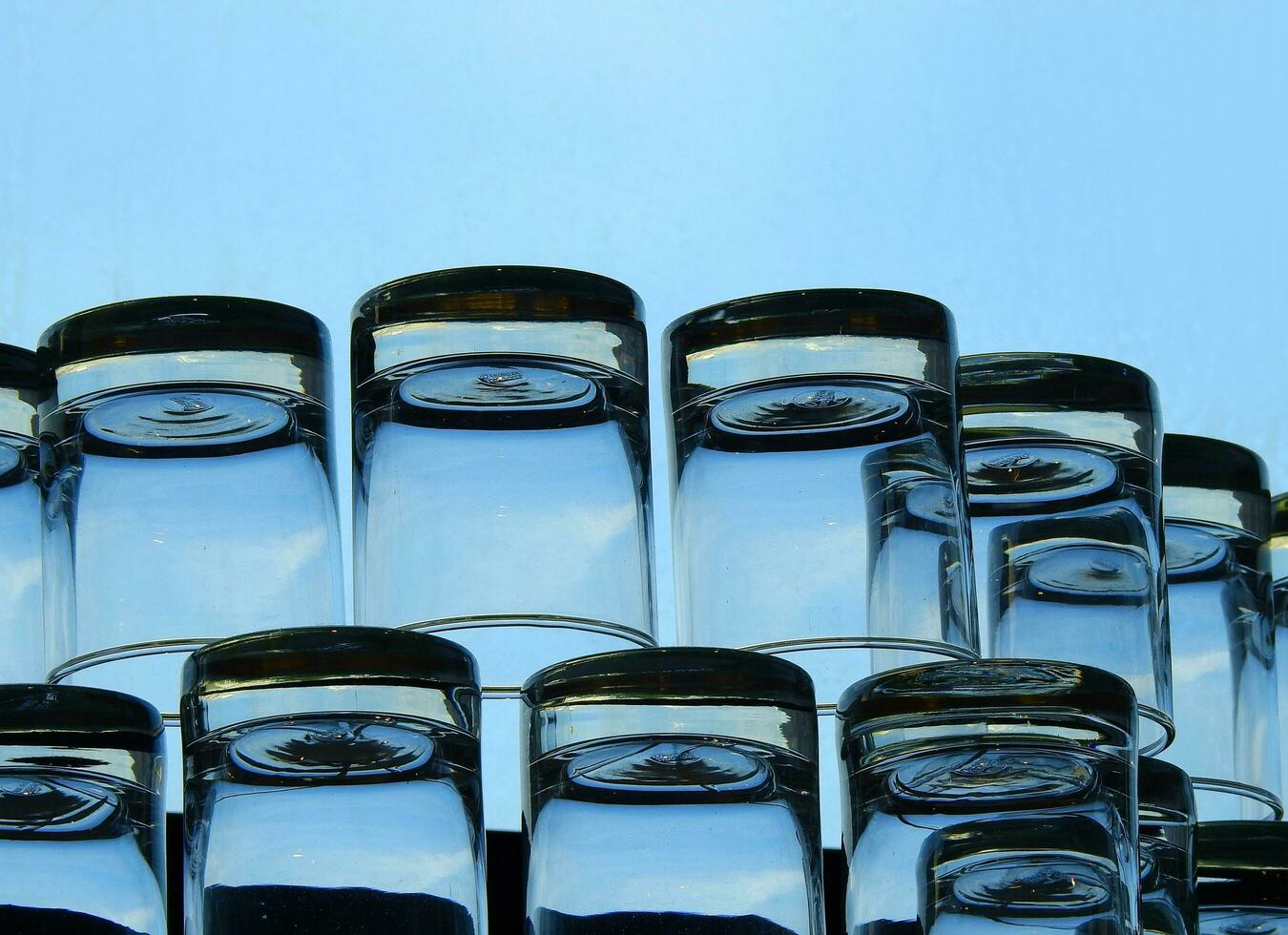 Crystal clear glass Placed on a blue background. photo