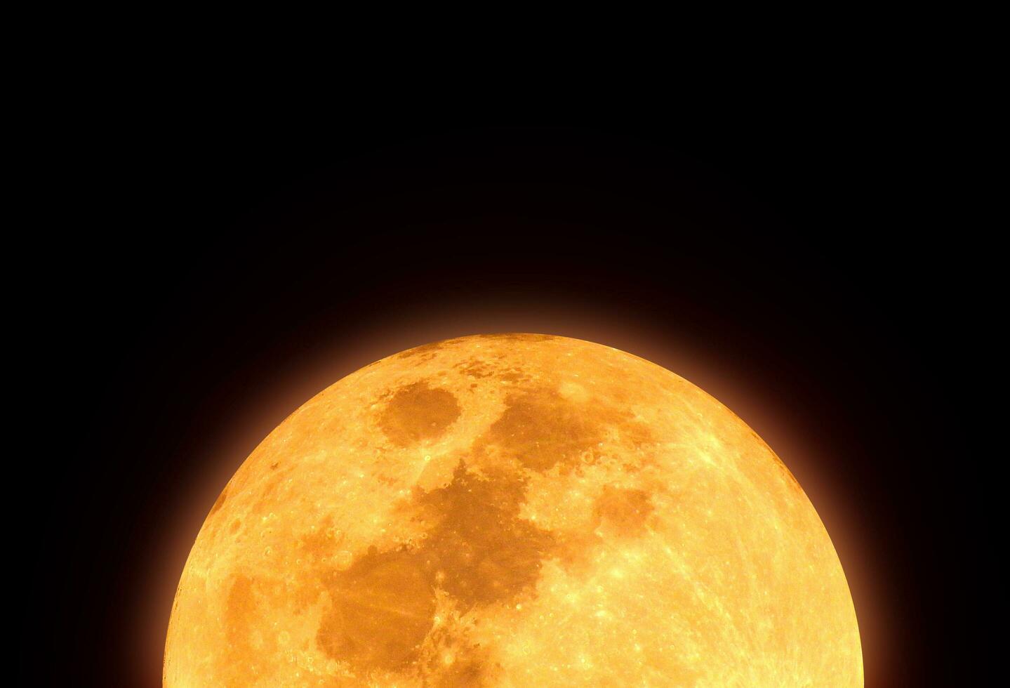 The yellow full moon and cloud on night sky photo