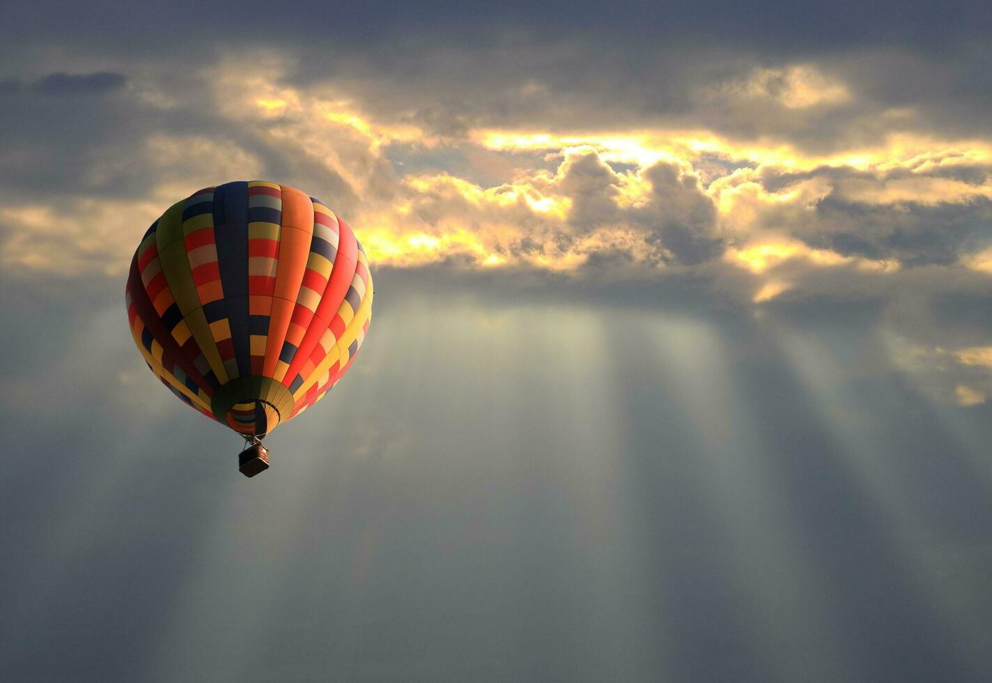 Hot air balloon in the sunset sky photo