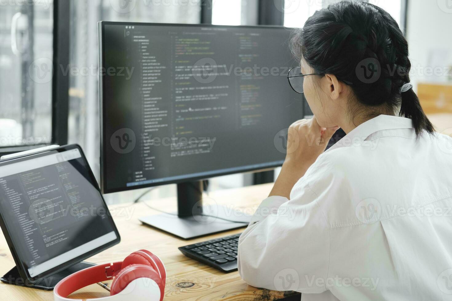 IT Programmer Starts Working on Desktop Computer. photo