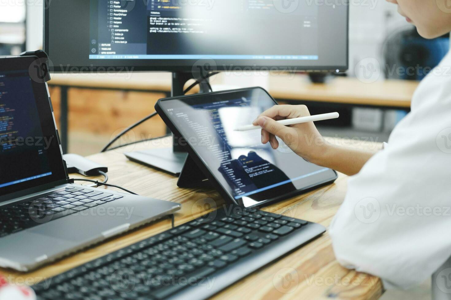 IT Programmer Starts Working on Desktop Computer. photo