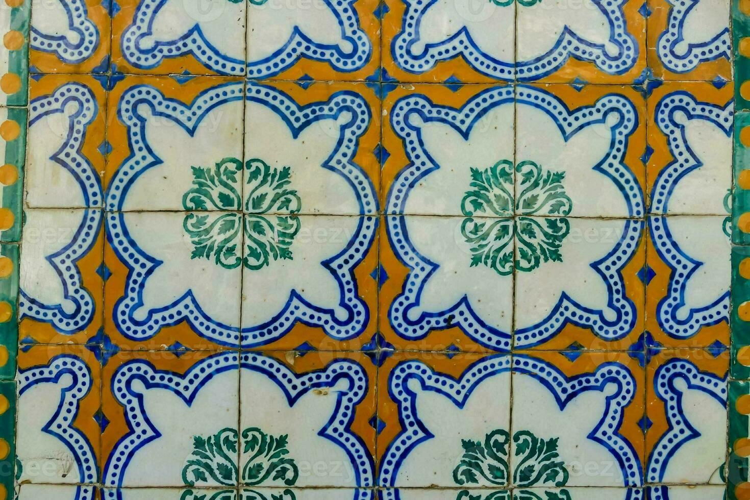 a close up of a blue and white tile floor photo