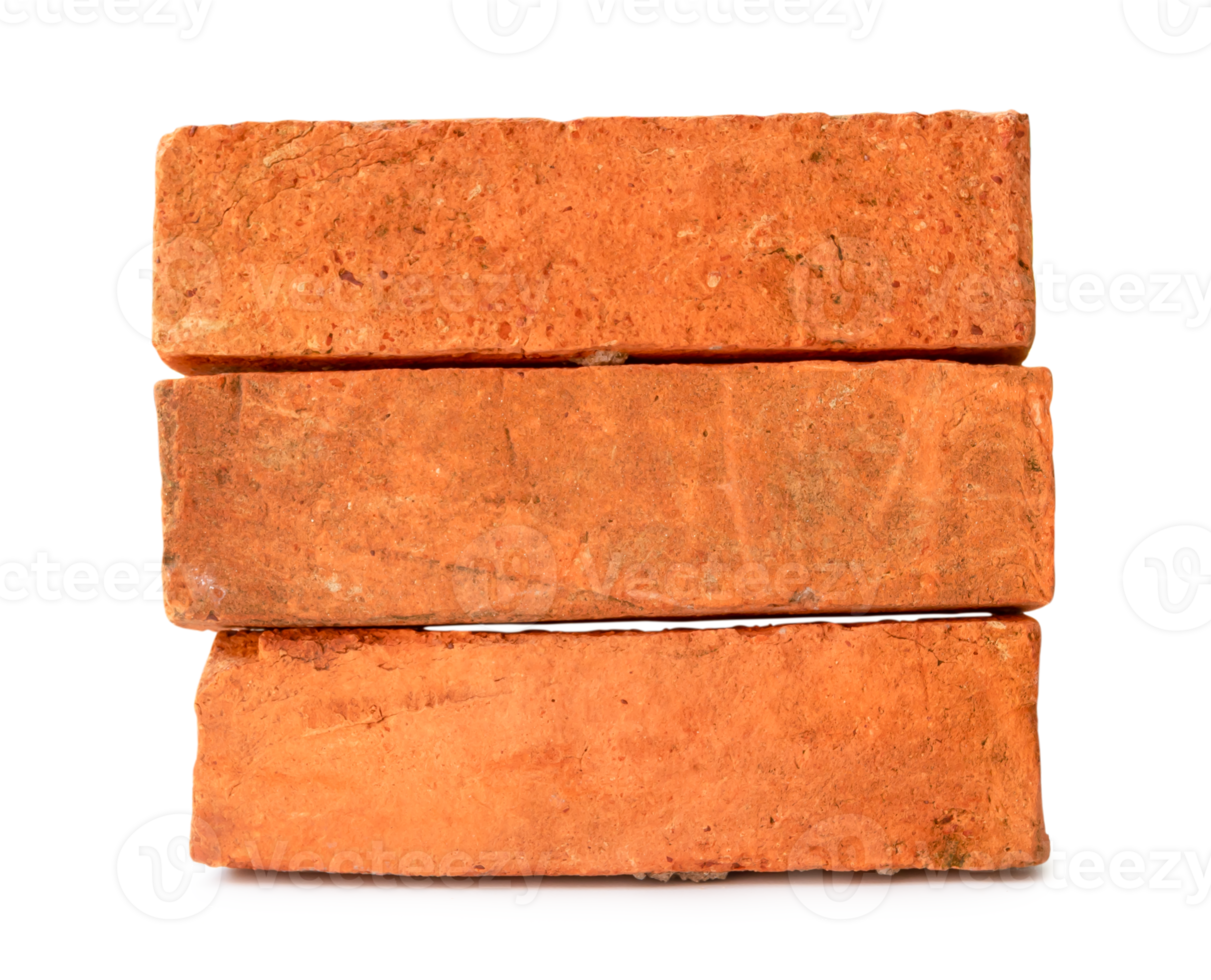 Cracked old red or orange bricks in stack isolated with clipping path in png file format
