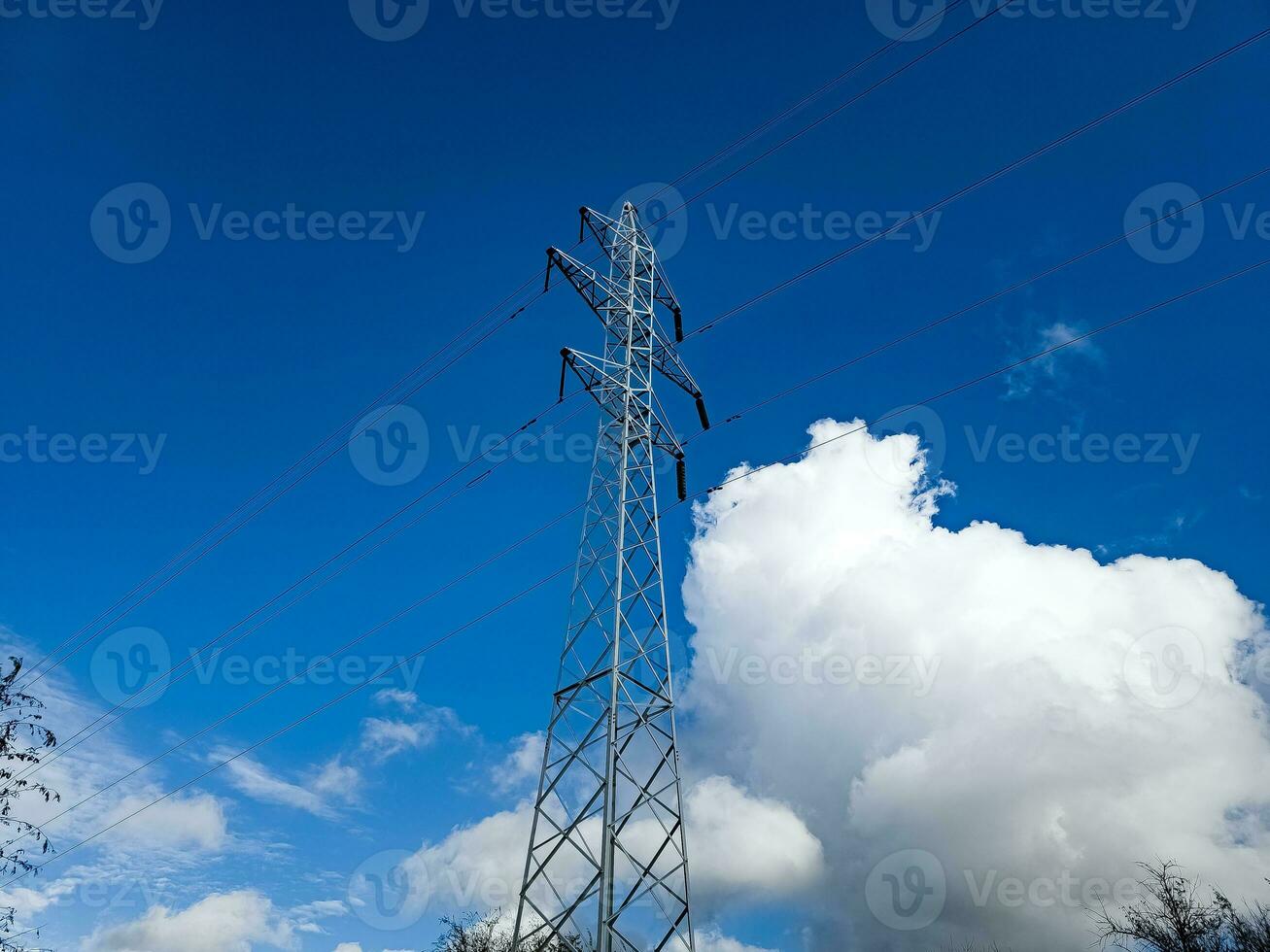 High voltage towers on skies background. Transmission line tower. photo