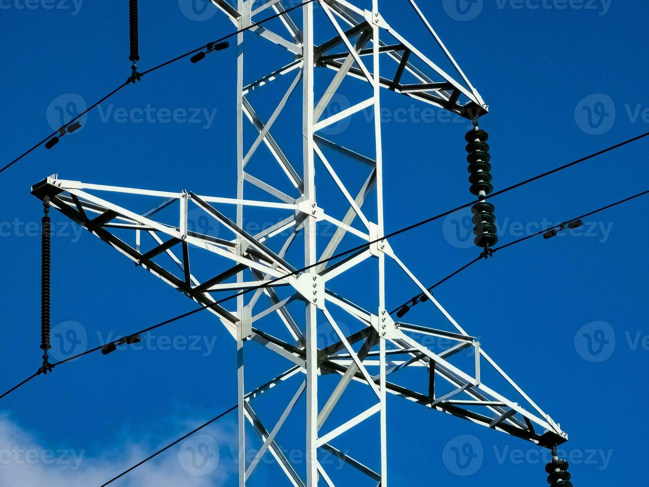 High voltage towers on skies background. Transmission line tower. photo