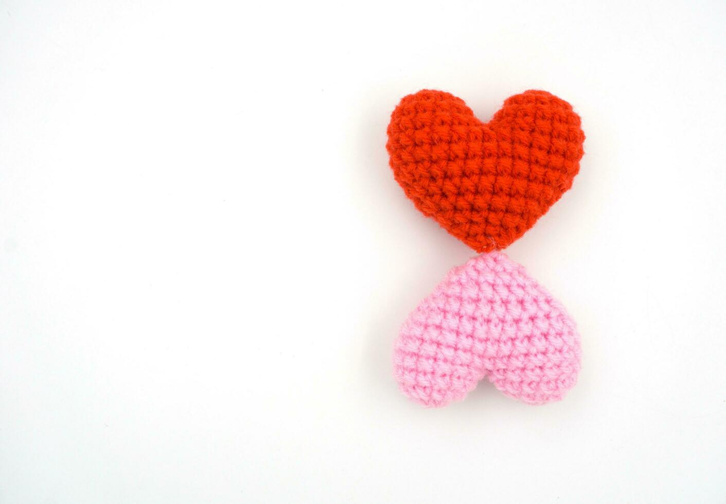 Heart made from yarn on a white background. photo