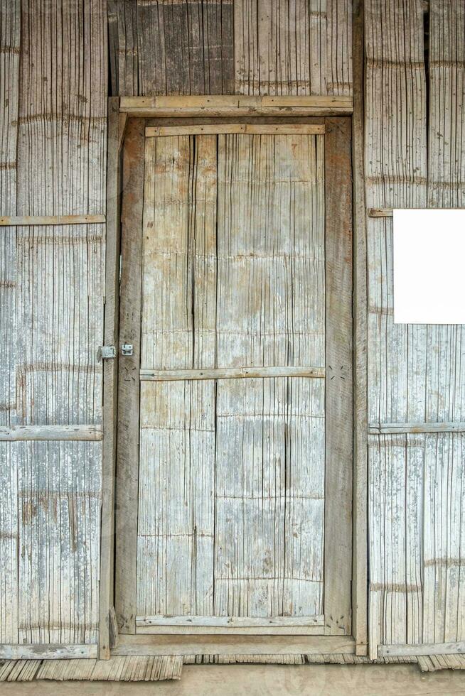 Bark bamboo weave door house photo