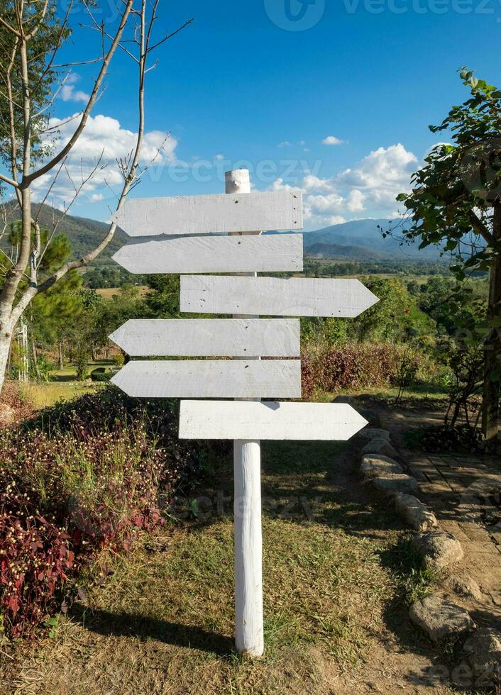 White wood signpost arrows blank photo