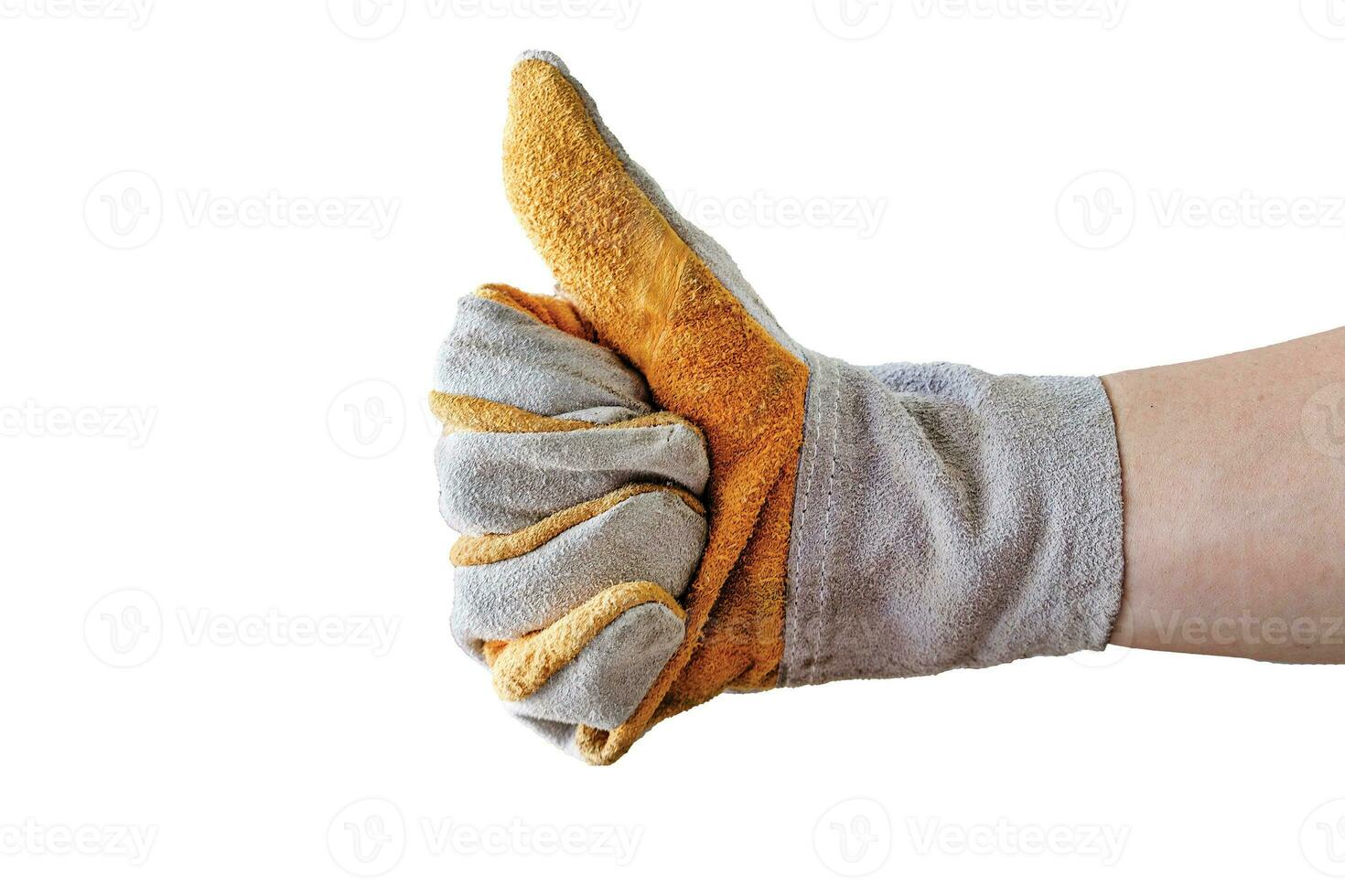 Hand of mechanic showing thumb up with safety glove photo