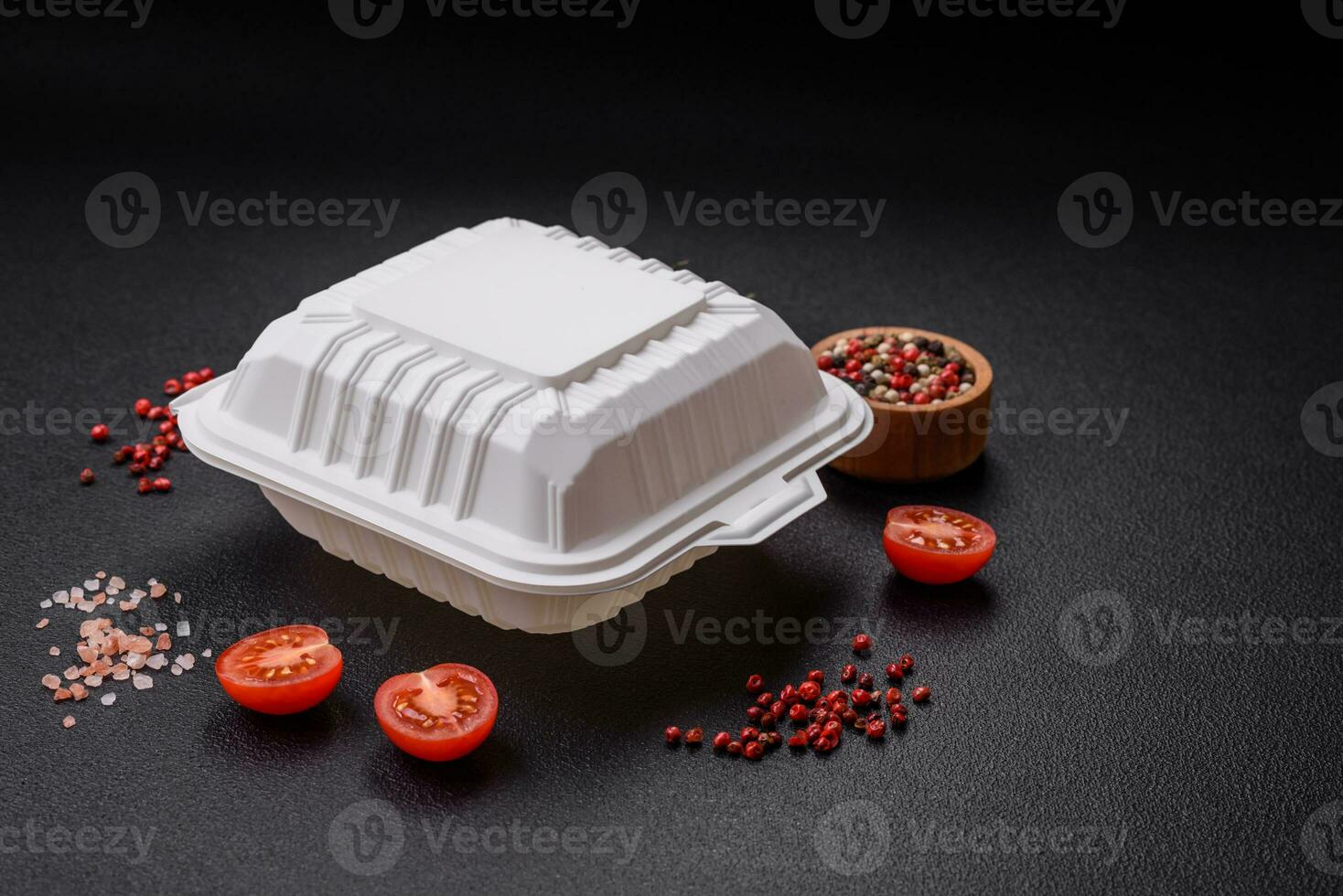 Square plastic or cardboard container of white color for food photo