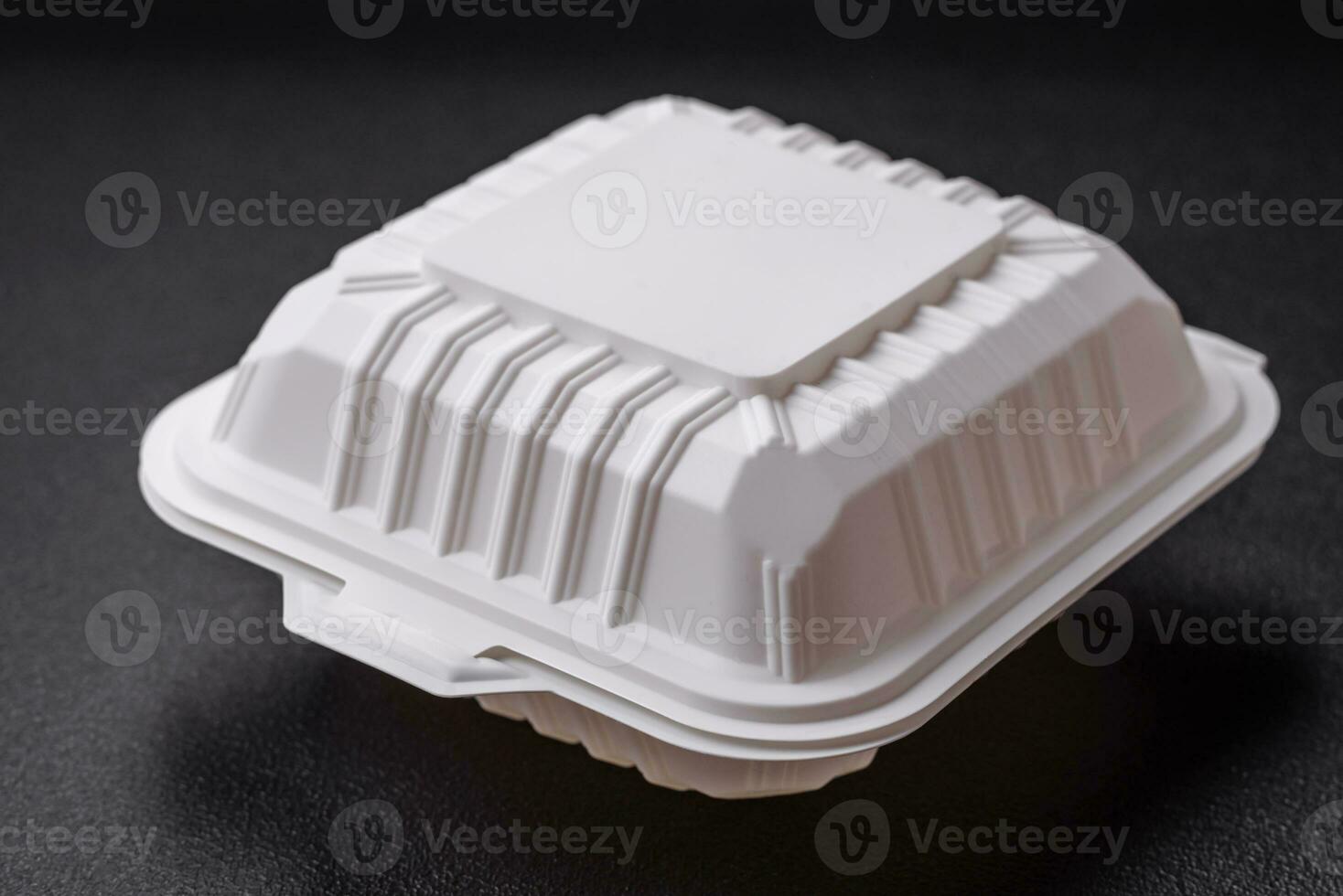 Square plastic or cardboard container of white color for food photo