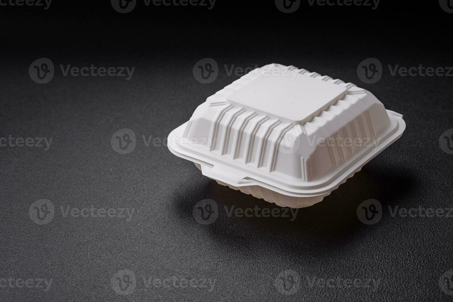 Square plastic or cardboard container of white color for food photo