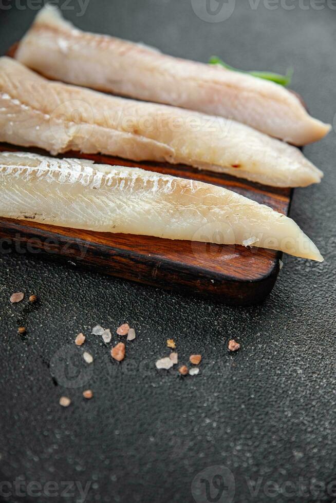 fish blue whiting fillet fresh seafood delicious healthy eating Pescetarian cooking appetizer meal food snack on the table copy space food background rustic top view photo