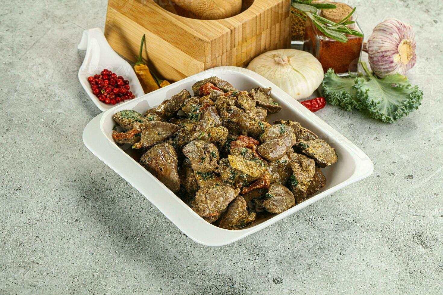 Chicken liver in cream sauce photo