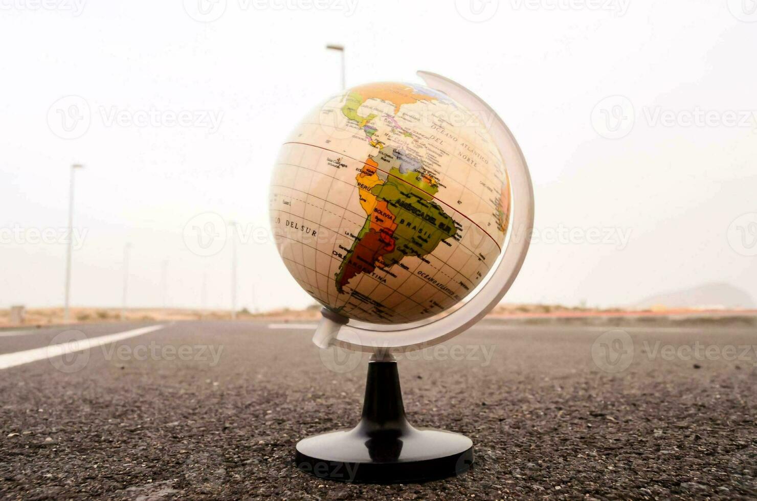 a globe on the road photo