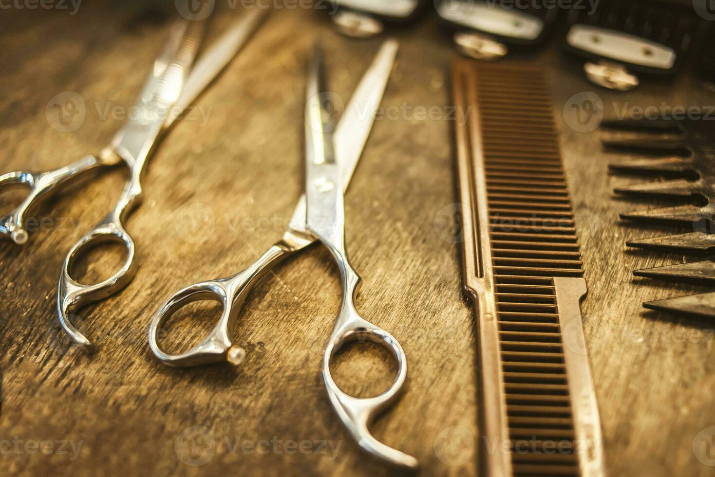 combs and scissors for haircuts lie on a shelf in the cabin photo