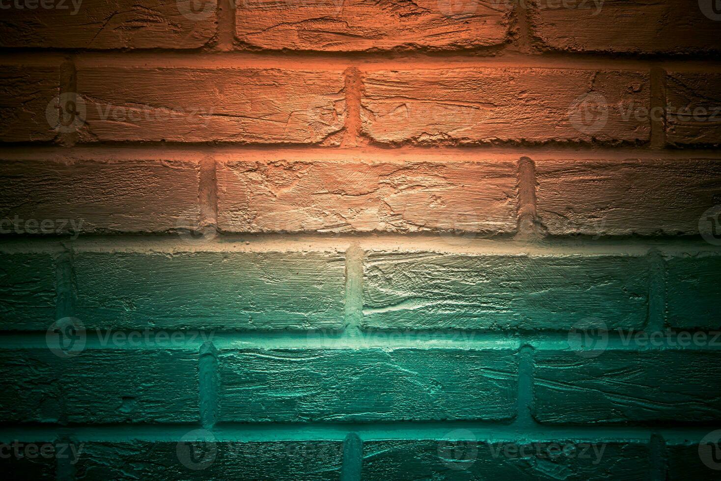 the surface of the brickwork is painted red-green photo