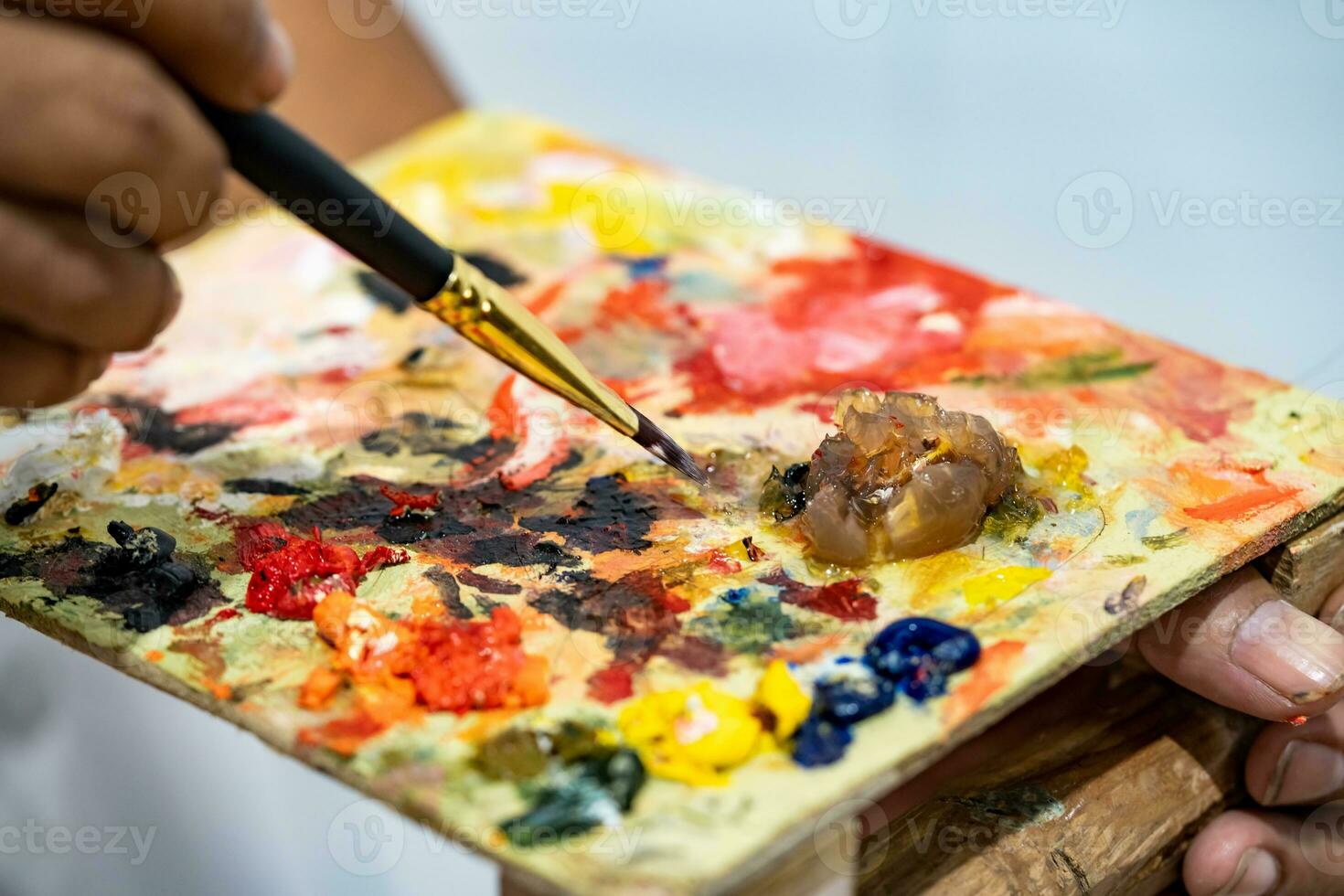 Close-Up Shot of a Painter Putting Acrylic Paint on a Palette · Free Stock  Photo