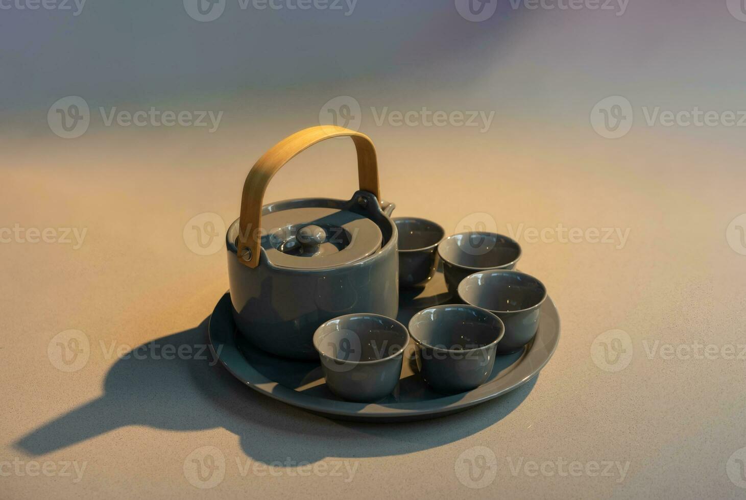 TeaPot ceramic set with New contemporary Modern and Vintage combination style on flat stone kitchen counter with sunlight from window. photo