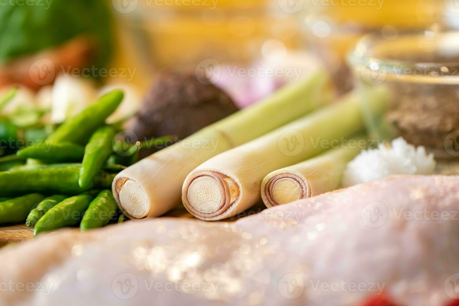 Lemongrass is placed between Thai chilli,salt and also having the background of food ingredients seasoning. photo