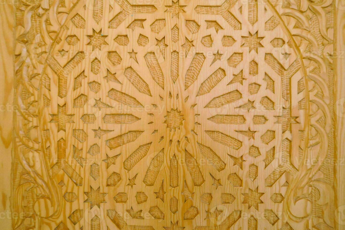 a carved wooden door with intricate designs photo