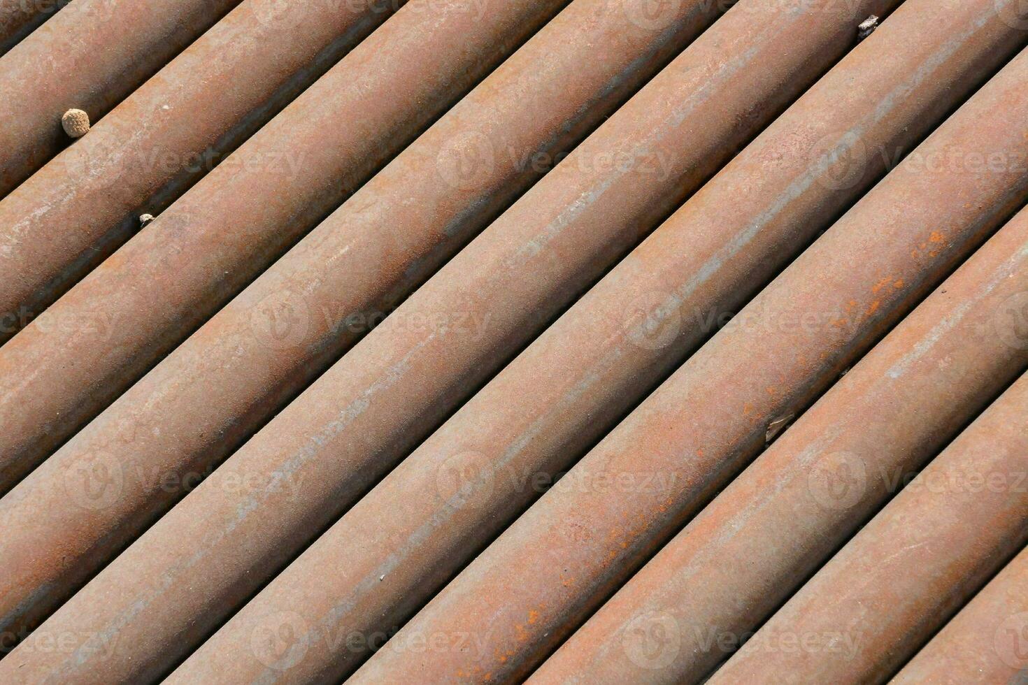 a close up of a row of metal pipes photo