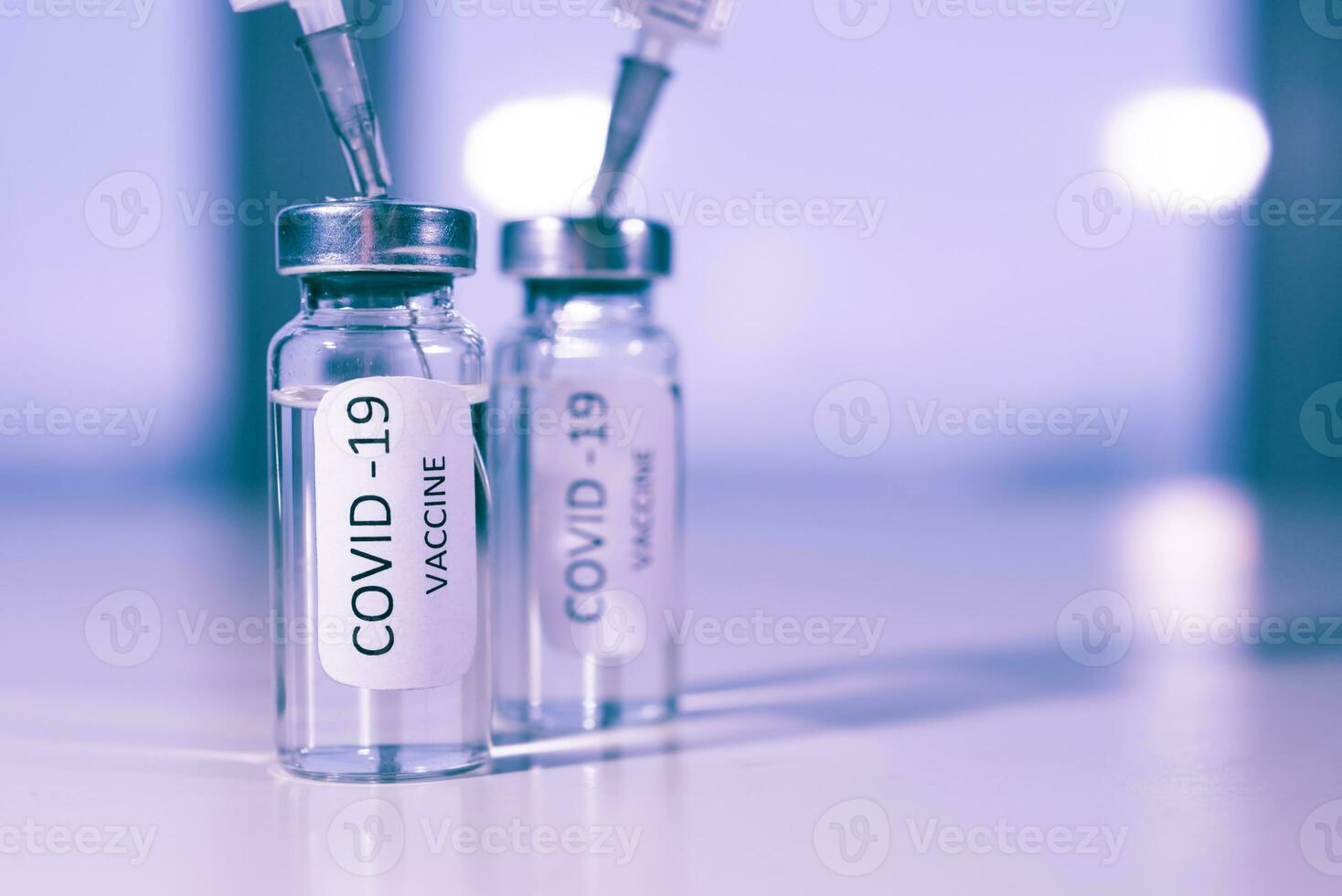 COVID-19 coronavirus vaccine. Ampoule and syringe close-up. Concept photo