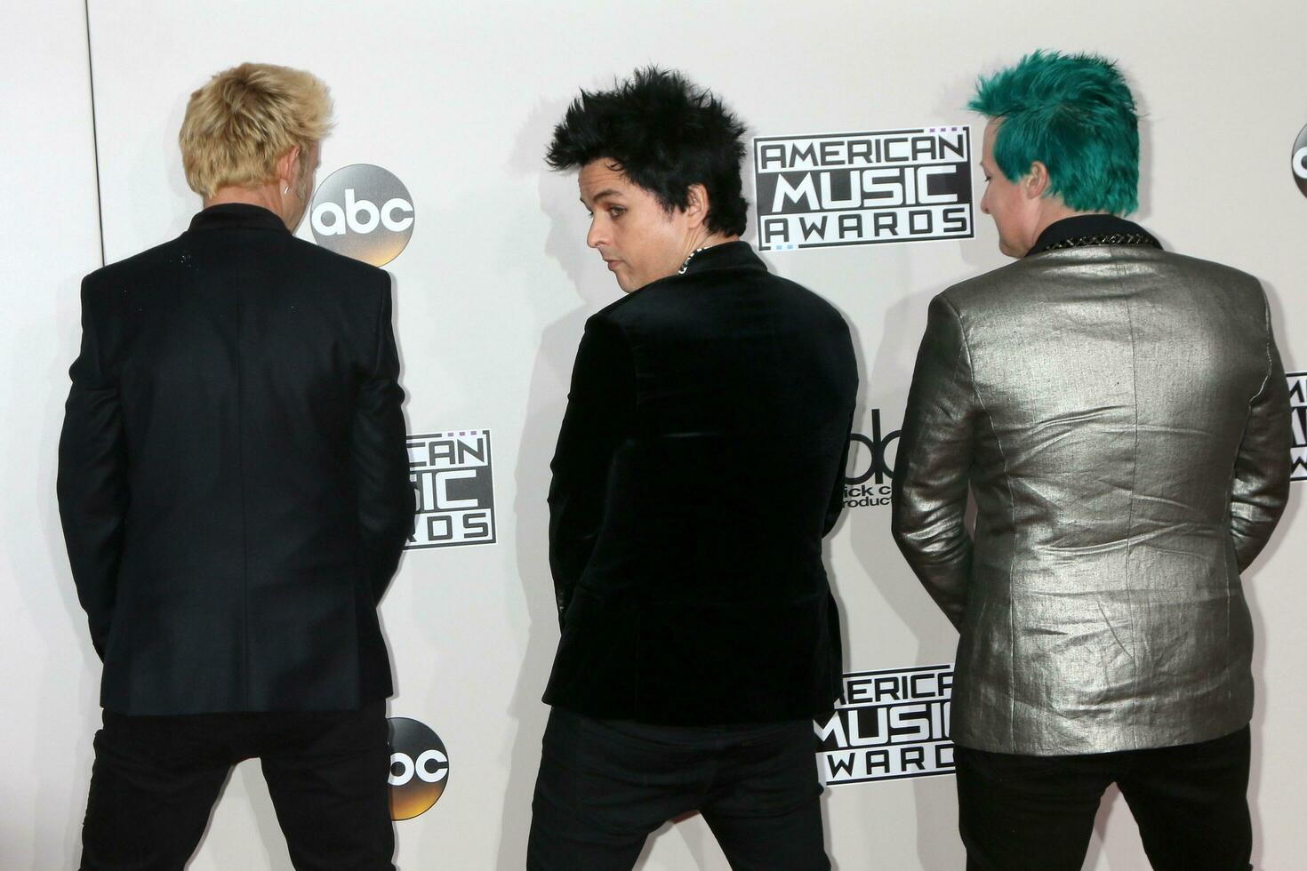 LOS ANGELES - NOV 20  Mike Dirnt, Billie Joe Armstrong, Tr Cool, Green Day at the 2016 American Music Awards at Microsoft Theater on November 20, 2016 in Los Angeles, CA photo