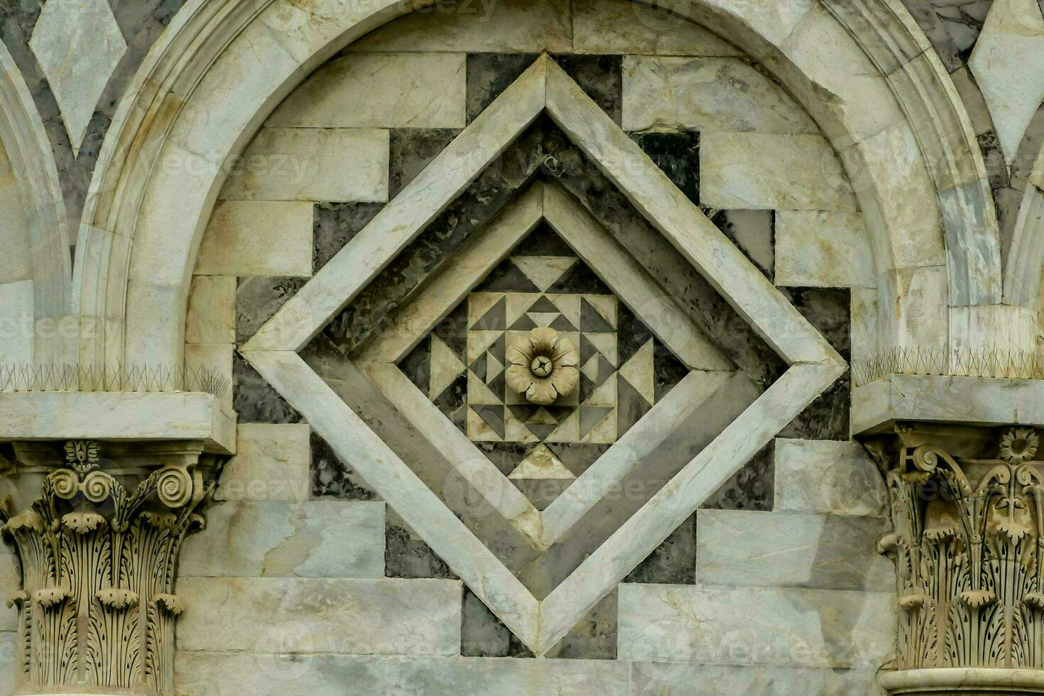 the facade of a building with a decorative diamond design photo