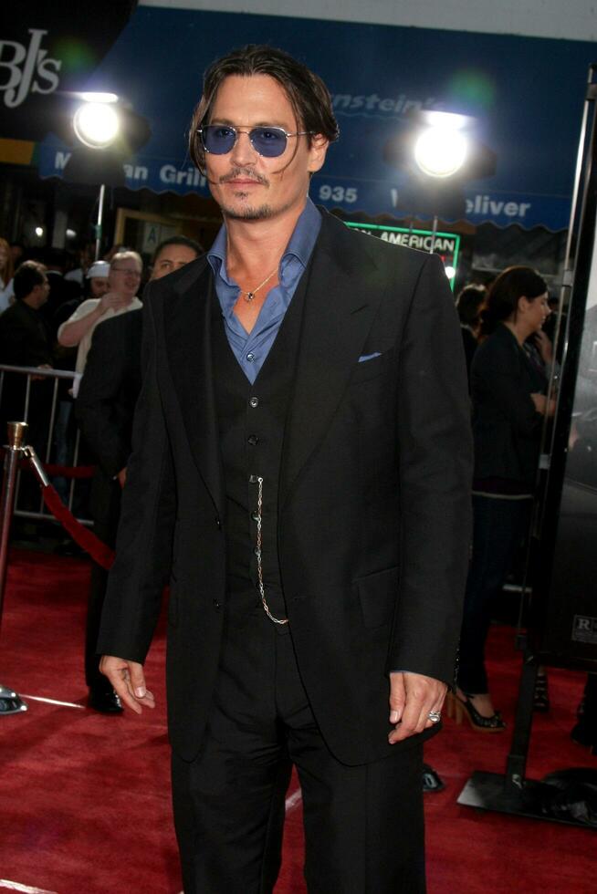 Johnny Depp arriving at the Public Enemies Premiere at the Manns Village Theater in Westwood CA on June 23 2009 photo
