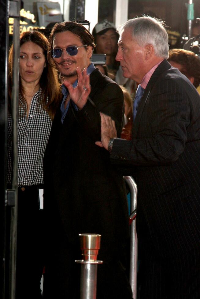 Johnny Depp arriving at the Public Enemies Premiere at the Manns Village Theater in Westwood CA on June 23 2009 photo