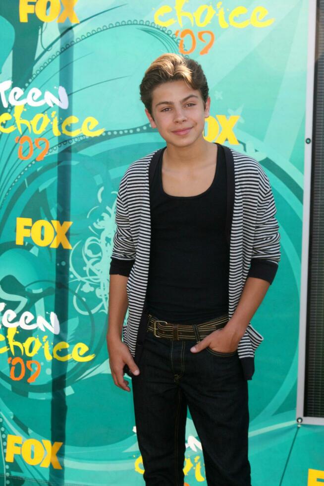 Jake T Austin arriving at the Teen Choice Awards 2009 at Gibson Ampitheater at Universal Studios Los Angeles CA on August 9 2009 photo