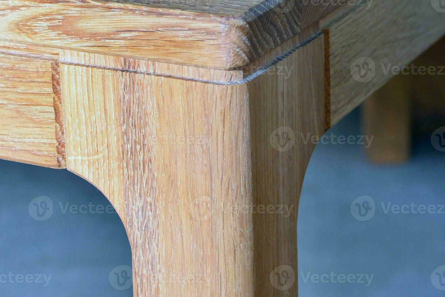 Wooden table surface. Natural wood furniture close view photo