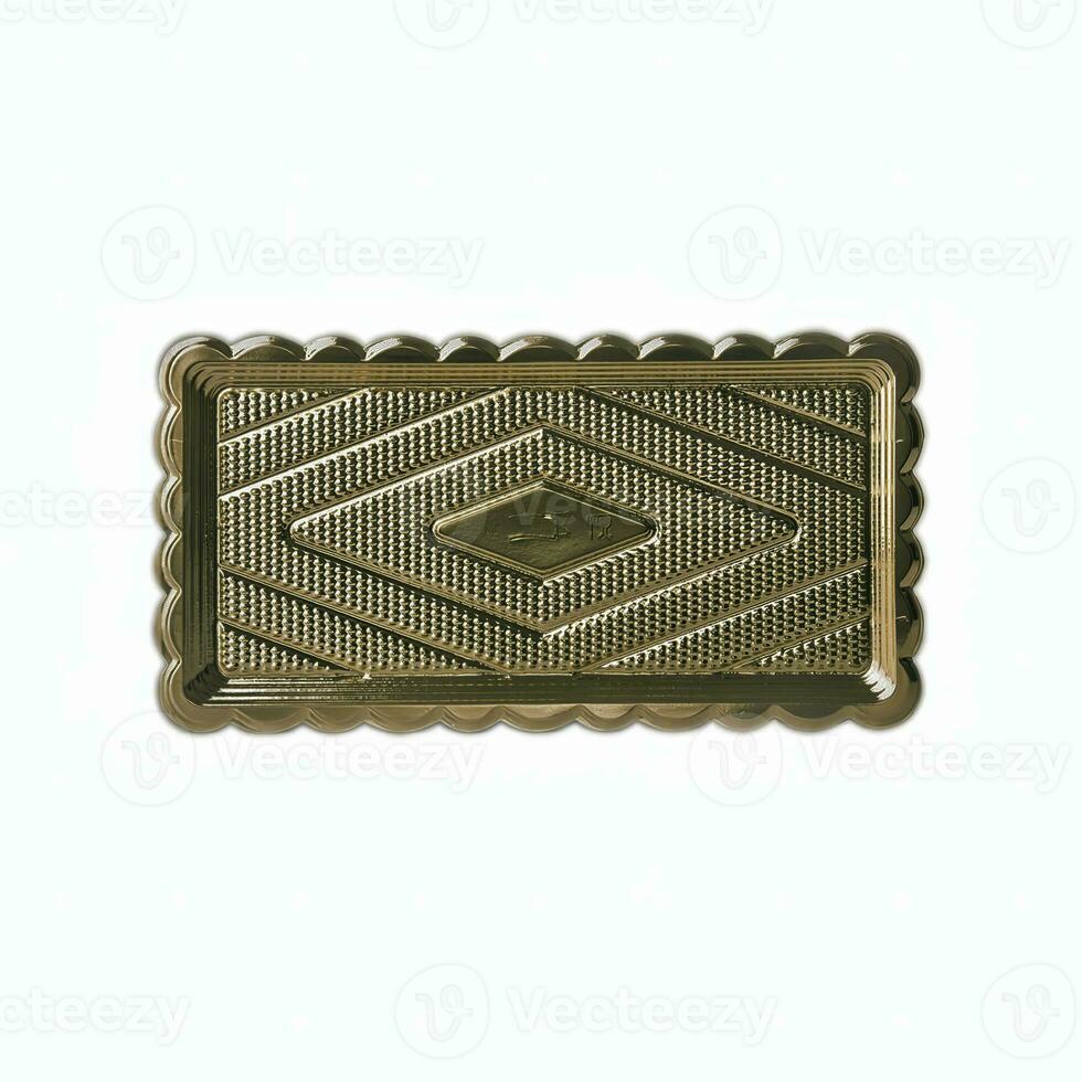 Golden plastic tray isolated over white background photo