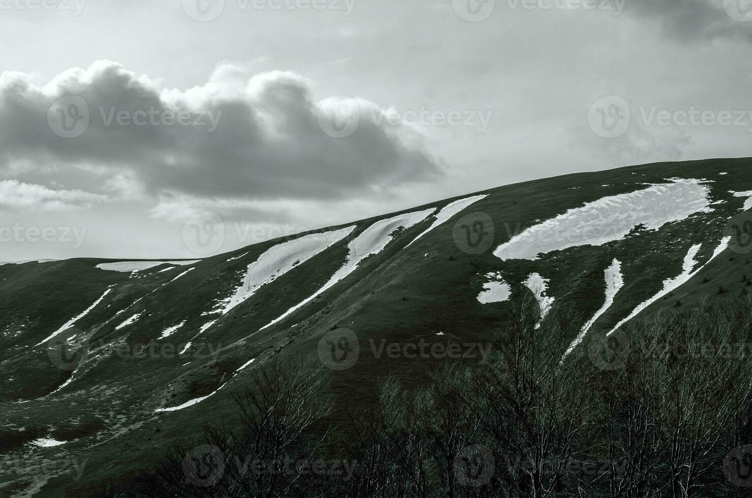 Mountain peaks covered with snow photo